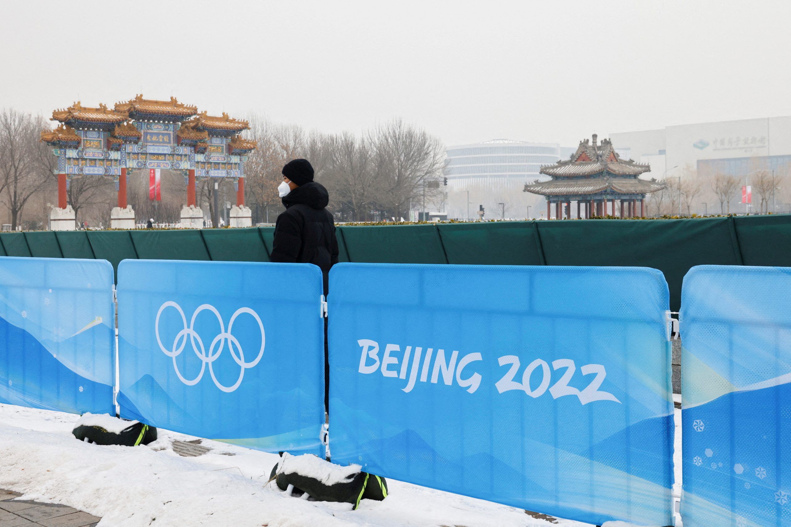 A security guard stands near the closed loop "bubble" at the Main Press Center ahead of the Beijing 2022 Winter Olympics in Beijing, China January 23, 2022. 