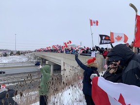 Hundreds of supporters gathered on the Wellington Road overpass Thursday to watch the Convoy for Freedom 2022, part of a nationwide protest against cross-border COVID-19 vaccine mandates. The convoy of transport trucks is on its way to Ottawa for a rally at Parliament Hill.