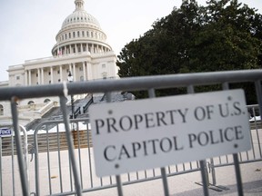 Bicycle fencing surrounds the US Capitol in Washington, DC, January 6, 2022, on the first anniversary of the attack on the US Capitol by supporters of then US President Donald Trump.