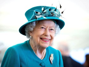 FILE PHOTO: Britain's Queen Elizabeth visits the Edinburgh Climate Change Institute at the University of Edinburgh