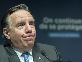 Quebec Premier François Legault at a news conference in Montreal, Thursday, December 30, 2021, where he gave an update on the ongoing COVID-19 pandemic in the province.