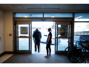 An emergency room nurse discharges a patient from Humber River Hospital in Toronto as the Omicron coronavirus variant continues to put pressure on Ontario's health care system.