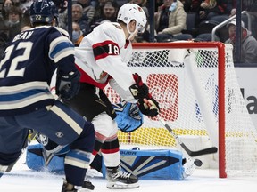 Ottawa Senators left wing Tim Stuetzle (18) puts a shot past Columbus Blue Jackets goaltender Elvis Merzlikins (90) in the second period at Nationwide Arena.