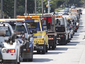 FILE: Tow truck operators gathered in 2015 to raise awareness for the move-over law.