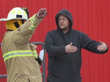 Fire at Eastway Tank on Merivale Road in Ottawa Thursday afternoon. Ottawa Fire emergency vehicles, Ottawa Police and Ambulance Service were at the scene and police indicate there was an explosion. Injuries were also reported and workers were sent to the hospital. Workers who got out of the building near the site Thursday. TONY CALDWELL, Postmedia.