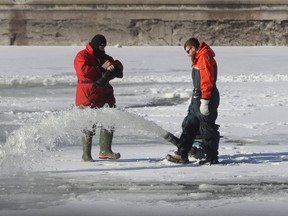 Crews are preparing the ice for skating on the Rideau Canal in Ottawa Monday.