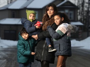 Mary Bishai and her kids Nicholas, 5, Chantal, 9, and Theodore, 2.