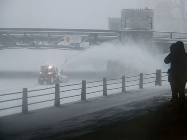 OTTAWA - Jan 17 2022 -. A snow plow blowing snow on the canal Monday.