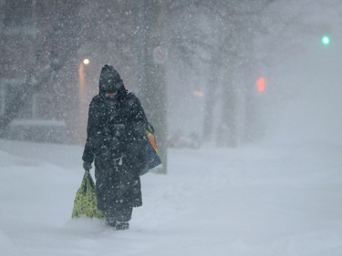 OTTAWA - Jan 17 2022 -. Walking through the snow in Ottawa Monday.