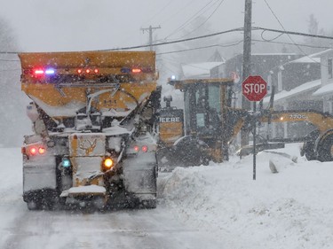 OTTAWA - Jan 17 2022 Snow crews clearing the streets of Ottawa Monday.