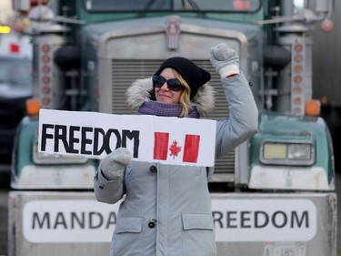 Anti vaccine mandate protesters and truckers still protesting on Wellington Street in Ottawa Monday morning.