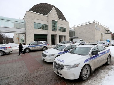 Ottawa Police officers parked at Ottawa City hall during a protest in Ottawa Monday morning.