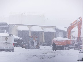 Invesigators continue their work at the Eastway Tank company on Monday, Jan. 17, 2022.