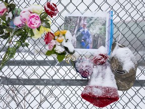 A memorial on the fence of the Eastway Tank company on Monday, Jan. 17, 2022