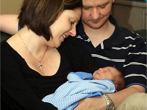Kimberley and Jeffrey Waara with the newborn son, Ethan, June 2010.