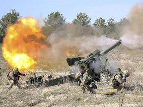 Ukrainians and Canadians do training exercises to get ready for large scale International military drills on Yavorivsky training ground, near Lviv in western Ukraine, in a file photo from April 2021.