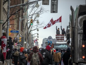 People gathered in downtown Ottawa during the “Freedom Convoy” protest, Sunday, Feb. 6, 2022.