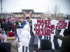 Ottawa-area residents opposed to the truck convoy protest downtown, gathered at Lansdowne Park on Saturday.