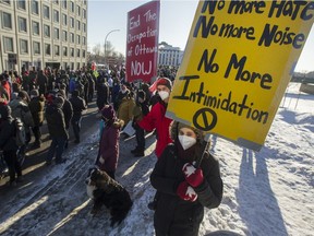 Ottawa residents opposed to the convoy protest held their own demonstration on Riverside Drive at Bank Street on Feb. 13, 2022, turning away truckers who were trying to access the downtown.