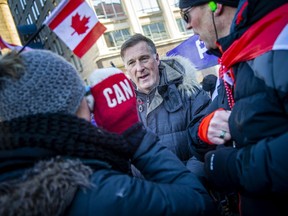 Maxime Bernier, leader of the Peoples Party of Canada, greets protesters at his pancake breakfast that was held by the Terry Fox Statue, at the "Freedom Convoy," Sunday, Feb. 13, 2022, Day 17 of the protest.