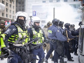 Police from all different forces across the country joined together to try to bring the "Freedom Convoy" occupation to an end Saturday, February 19, 2022.