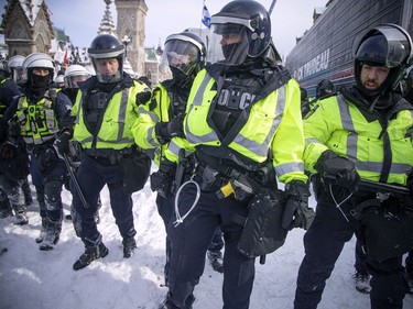 Police from all different forces across the country joined together to try to bring the "Freedom Convoy" occupation to an end Saturday, February 19, 2022. Police used paper spray and stun grenades as they moved west on Wellington Street Saturday.