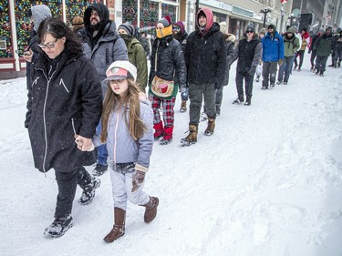 Police from all different forces across the country joined together to try to bring the "Freedom Convoy" occupation to an end Saturday, February 19, 2022. There were a small group of children playing and taking part in the protest on Sparks Street Saturday.