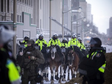 Police from all different forces across the country joined together to try to bring the "Freedom Convoy" occupation to an end Saturday, February 19, 2022. Toronto Police Mounted Unit officers were back on Wellington Street Saturday, moving protesters out of the occupied areas.
