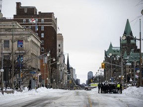 Police from all across Canada were still in the area, along with city workers getting the area around Parliament Hill back to normal, Sunday, February 20, 2022.ASHLEY FRASER, POSTMEDIA