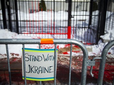 The protest started on Charlotte Street and the supporters then marched down Laurier, ending at City Hall. Red paint could be seen on the front gates of the Russian Embassy Sunday afternoon.