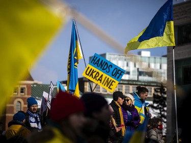 A large group of people gathered outside the Russian Embassy in Sandy Hill, to stand united with Ukrainians and protest the Russia invasion of Ukraine, Sunday, Feb. 27, 2022. The protest started on Charlotte Street and the supporters then marched down Laurier, ending at City Hall.