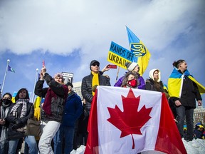 People gathered outside the Russian Embassy in Sandy Hill, to protest the Russia invasion of Ukraine on Sunday. The Russian government complained they were a security threat.