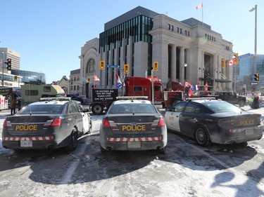 OPP (police) on site of the 'Freedom Convoy' on Wellington Street in Ottawa, Feb. 14, 2022.