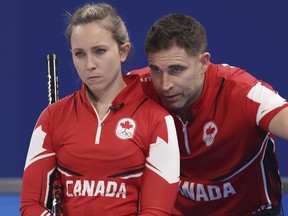 Rachel Homan and John Morris of Team Canada look on against Team Czech Republic during the Curling Mixed Doubles Round Robin on Day 2 of the Beijing 2022 Winter Olympics at National Aquatics Centre on February 06, 2022 in Beijing, China.