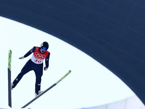 ZHANGJIAKOU, CHINA - FEBRUARY 09: Laurent Muhlethaler of Team France competes during Individual Gundersen Normal Hill/10km Ski Jumping Competition Round at The National Cross-Country Skiing Centre on February 09, 2022 in Zhangjiakou, China.