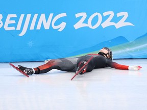 BEIJING, CHINA - FEBRUARY 09: Kim Boutin of Team Canada reacts after a fall during the Women's 1000m Heats on day five of the Beijing 2022 Winter Olympic Games at Capital Indoor Stadium on February 09, 2022 in Beijing, China.