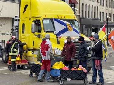 Anti-vaccine mandate protests continue in downtown Ottawa on Friday, Feb. 11, 2022. Refuelling their trucks at Rideau Street and Sussex Drive.