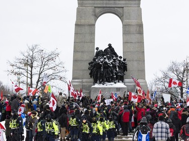 Anti-vaccine mandate protests continue in downtown Ottawa. Veterans and supporters removed the fencing that had surrounded the National War Memorial. Saturday, Feb. 12, 2022.