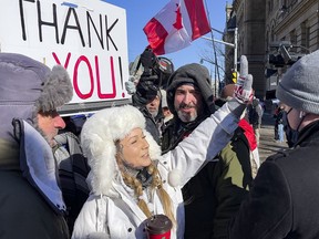 OTTAWA -- Anti vaccine mandate protests continuing in downtown Ottawa. Protesters harass a CTV journalist on Monday, Feb. 14, 2022