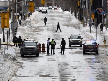 OTTAWA -- A police checkpoint on Metcalfe Street following the dispersal of anti mandate protesters that occupied the nation's capital for over three weeks. Monday, Feb. 21, 2022