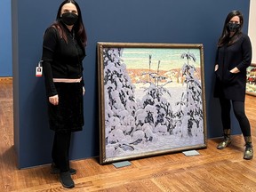 Curator Katerina Atanassova and assistant conservator Marie-Catherine Cyr prepare for the Canada and Impressionism: New Horizons exhibition at the National Gallery. Artwork: Lawren S. Harris, Snow II, 1915, National Gallery of Canada, Ottawa © Family of Lawren S. Harris.