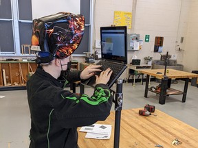 Transportation SHSM student Isabella Wasilka uses technology to design and weld a Chromebook holder.  SUPPLIED PHOTOS