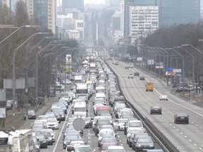 Heavy traffic is seen on a road heading out of the Ukrainian capital Kyiv, as Russian military operation begins, in Ukraine, February 24, 2022 in this screen grab taken from a live video.