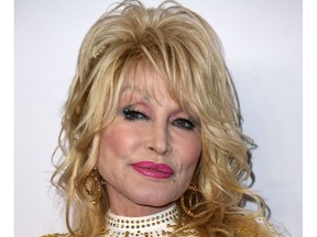 (FILES) In this file photo taken on February 08, 2019 US singer-songwriter and 2019 MusiCares Person Of The Year Dolly Parton