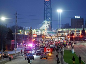 Demontrators against vaccine mandates block the roadway at the Ambassador Bridge border crossing, in Windsor, Ontario, Canada on Feb. 9, 2022.