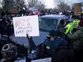 Counter-protesters set up a blockade on Riverside Drive at Bank Street on Sunday, Feb. 13, 2022.