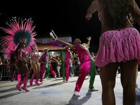 Revellers of Mangueira Samba School parade at Cidade do Samba (City of Samba) despite Carnival celebrations being postponed to April due to COVID-19, in Rio de Janeiro, Brazil, February 28, 2022.