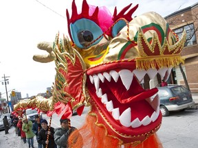 Files: Chinese New Year is celebrated with a Lion Dance along Somerset Street