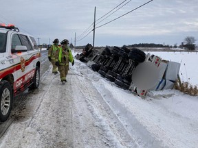 Truck flipped near North Gower