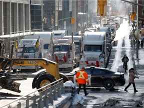 Vehicles continue to block downtown streets as truckers and supporters protest coronavirus disease (COVID-19) vaccine mandates in Ottawa, Ontario, Canada, February 1, 2022.